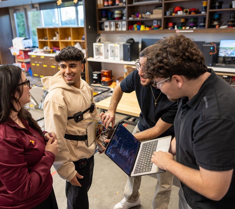 Students gathered to identify real-world problems then design and build solutions to address them.